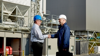Endress+Hauser sales engineer with the manager of a power plant